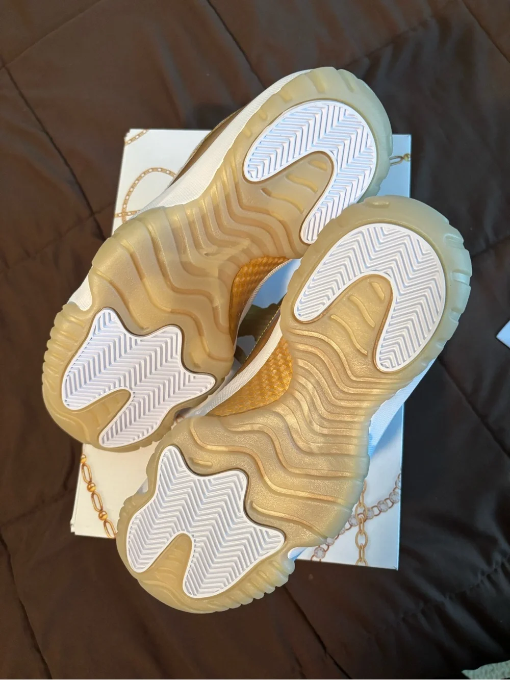 Jordan Low Top Sneakers in White and Gold Metallic